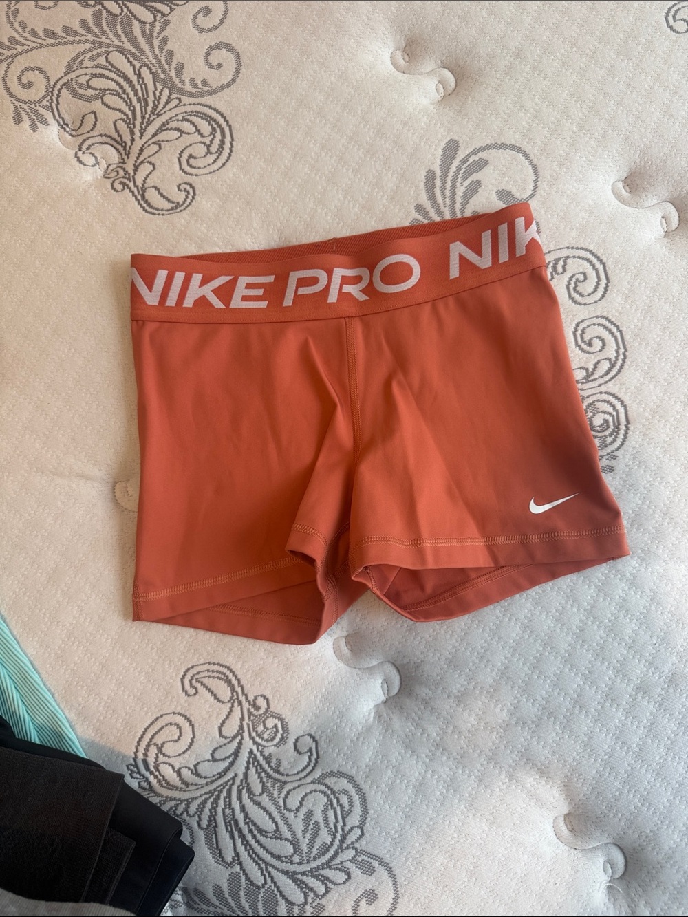 Nike Pro Women’s Rust Orange Athletic Shorts